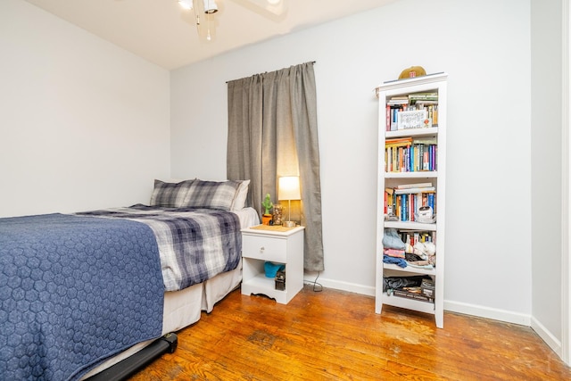 bedroom featuring ceiling fan and light wood-type flooring