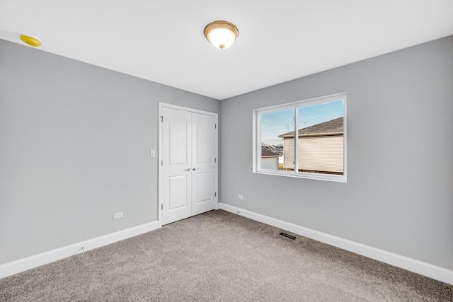 view of carpeted spare room