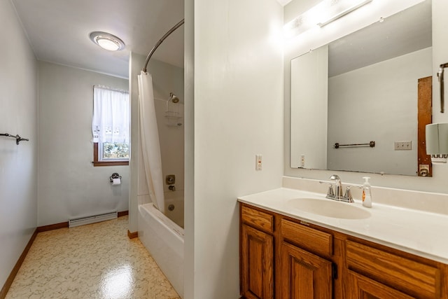 bathroom with shower / tub combo, baseboard heating, vanity, and baseboards