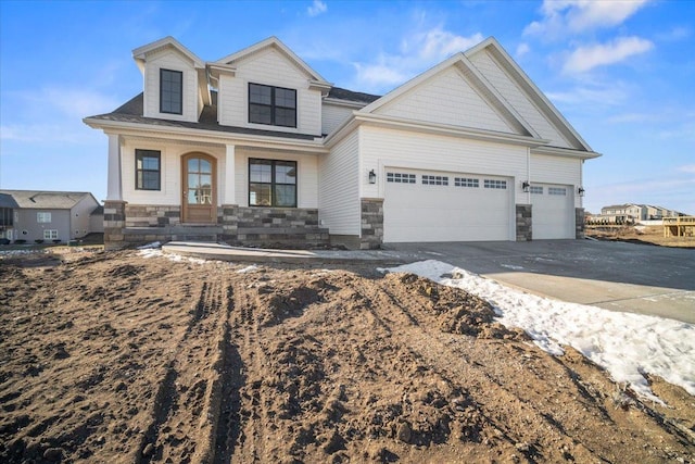 craftsman inspired home featuring a garage