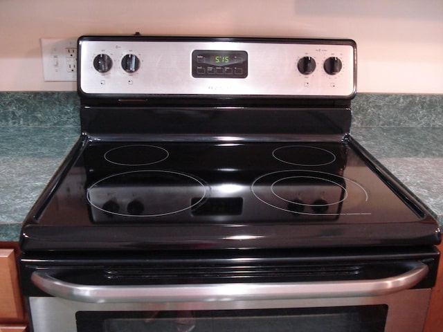 interior details with stainless steel electric range