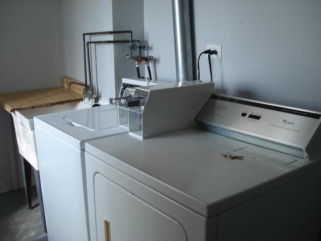 laundry area featuring washing machine and dryer