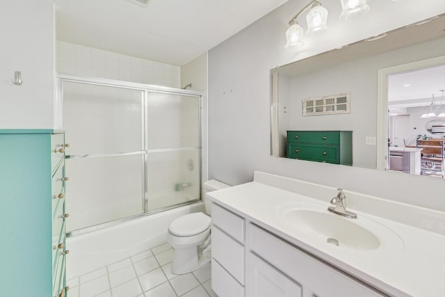 full bathroom featuring combined bath / shower with glass door, toilet, tile patterned flooring, and vanity