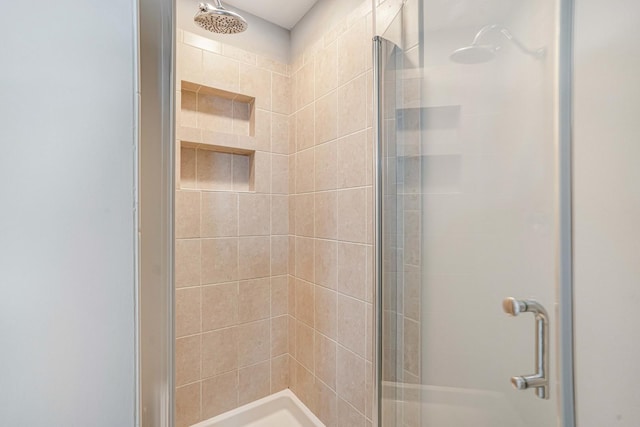 bathroom with an enclosed shower