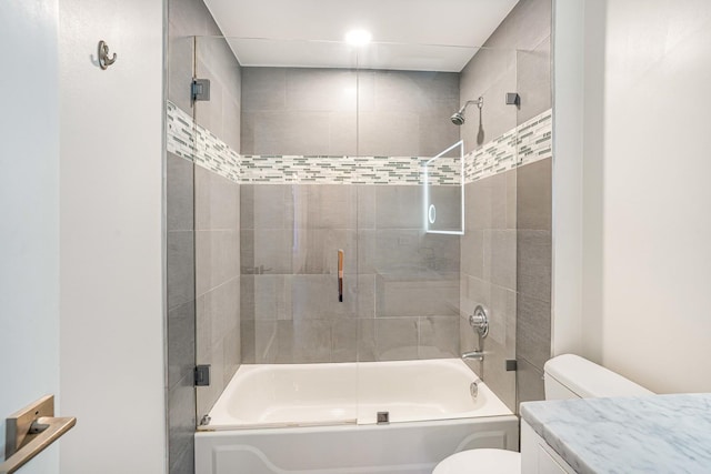 full bathroom with vanity, toilet, and combined bath / shower with glass door