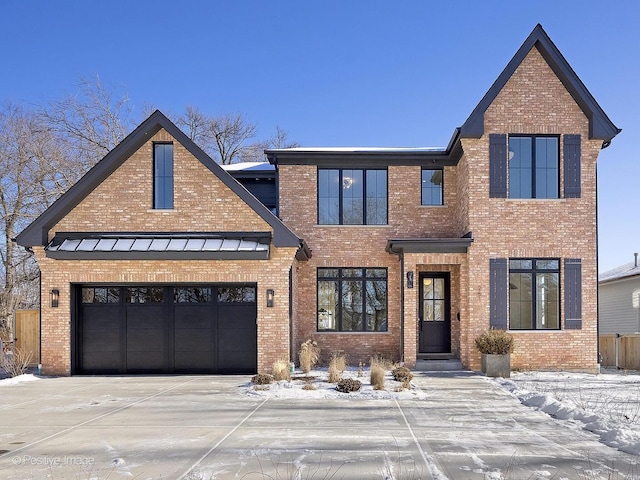 view of front of home with a garage