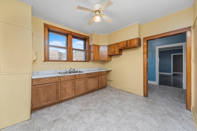 kitchen with sink and ceiling fan