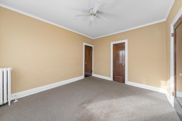 unfurnished bedroom with ornamental molding, ceiling fan, carpet, and radiator