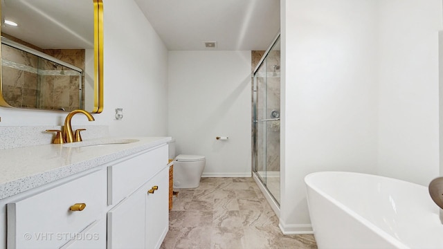 full bathroom featuring separate shower and tub, vanity, and toilet