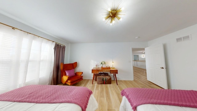 bedroom with wood-type flooring