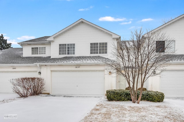 front of property featuring a garage