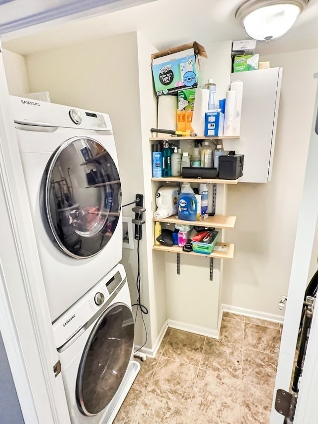 laundry room featuring stacked washer / dryer