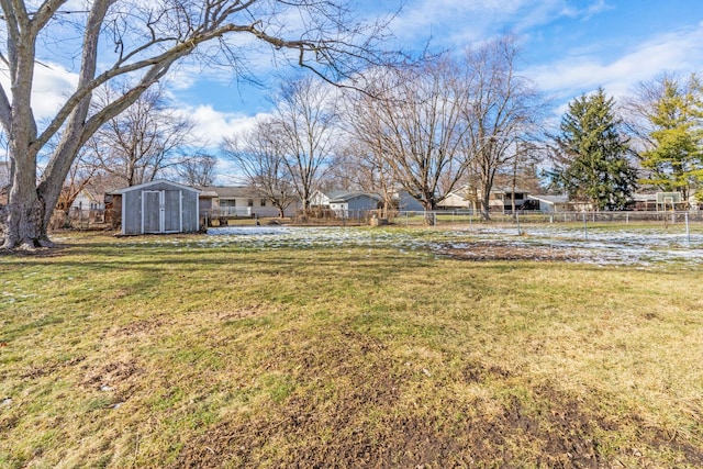 view of yard with a storage shed