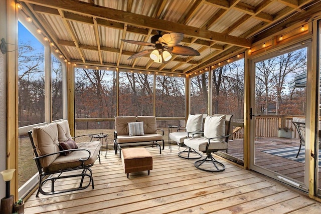 sunroom / solarium with ceiling fan