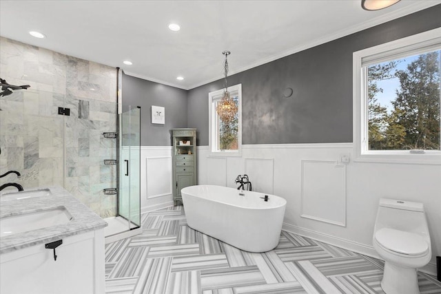 full bathroom featuring vanity, ornamental molding, toilet, and separate shower and tub