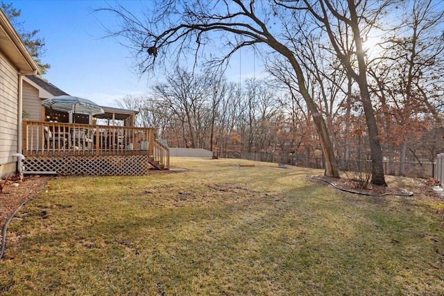 view of yard featuring a wooden deck