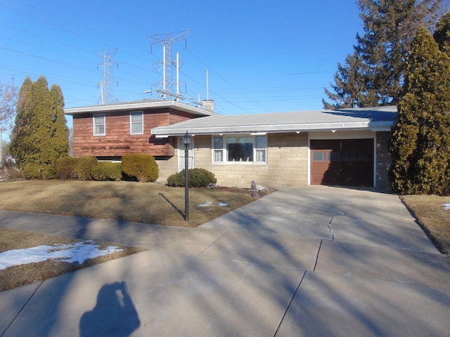 split level home featuring a garage