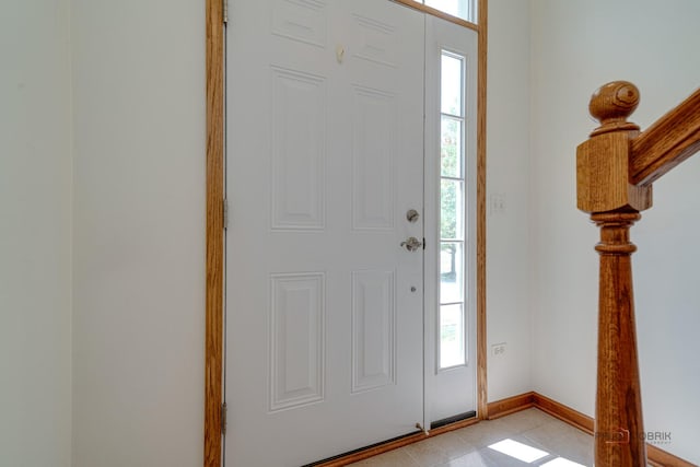 foyer entrance featuring plenty of natural light