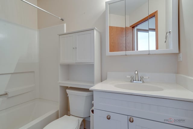 full bathroom with washtub / shower combination, toilet, and vanity