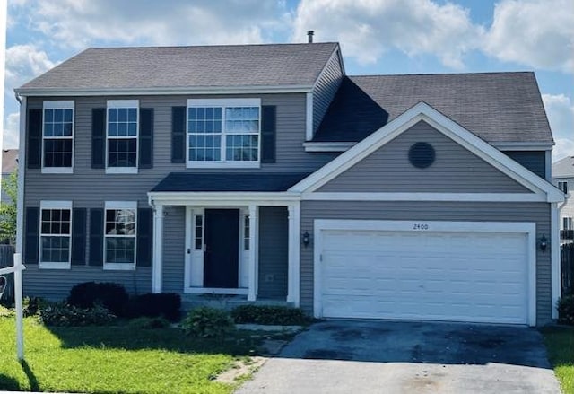 view of front of property with a front lawn