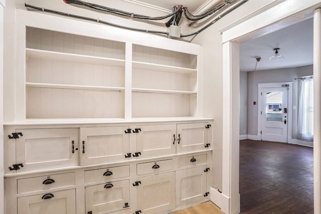 interior space with hardwood / wood-style floors