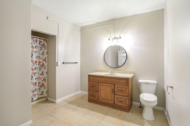 bathroom with vanity, walk in shower, tile patterned floors, and toilet