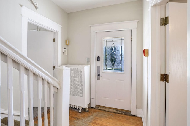 foyer with hardwood / wood-style flooring