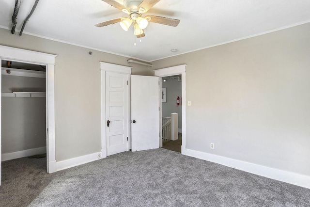 unfurnished bedroom featuring carpet flooring, ceiling fan, and a closet