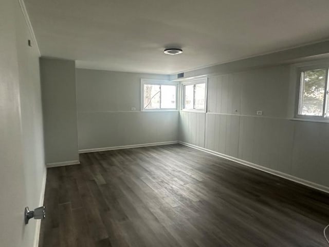 175 Westwood Dr, Park Forest, IL 60466 - empty room featuring dark wood finished floors, healthy amount of natural light, and baseboards