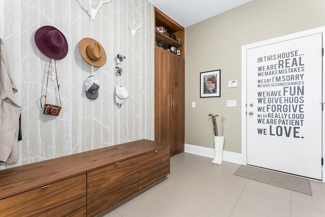 mudroom with light tile patterned flooring