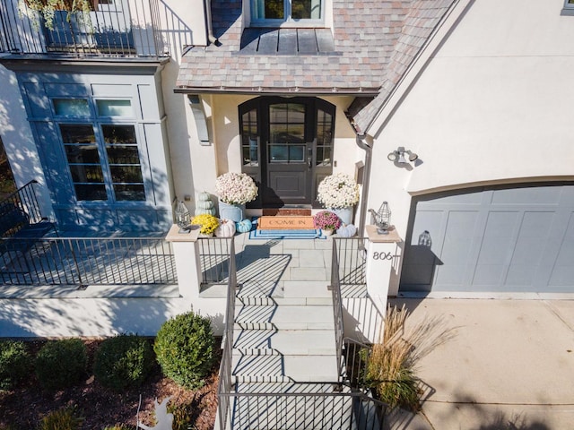 entrance to property featuring a garage