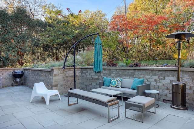 view of patio featuring area for grilling and an outdoor hangout area