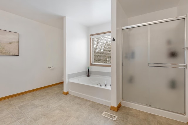 bathroom with shower with separate bathtub and toilet