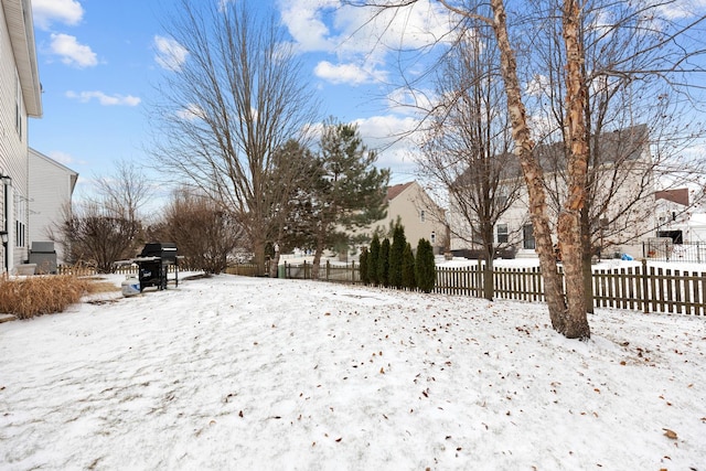 view of yard covered in snow