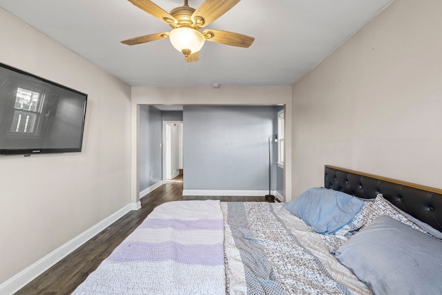 bedroom featuring dark hardwood / wood-style floors and ceiling fan