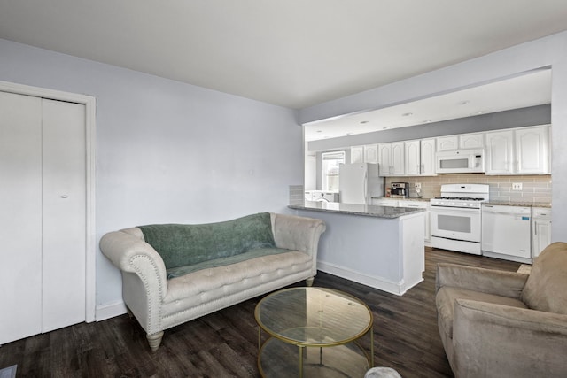 living room with dark wood-type flooring