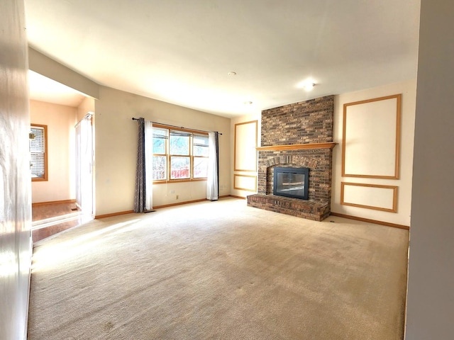 unfurnished living room with a brick fireplace and light colored carpet