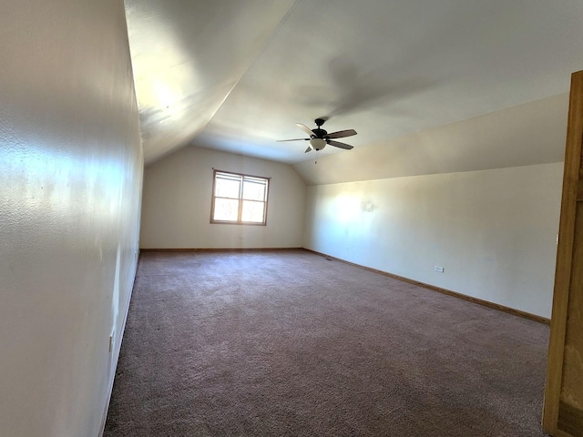 bonus room featuring carpet floors, ceiling fan, and vaulted ceiling