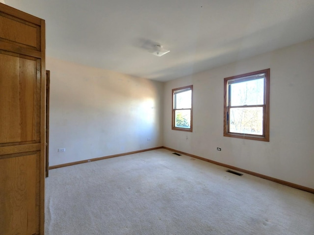 view of carpeted spare room