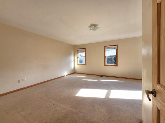 view of carpeted spare room