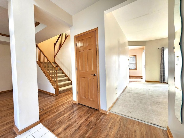 hall with light wood-type flooring