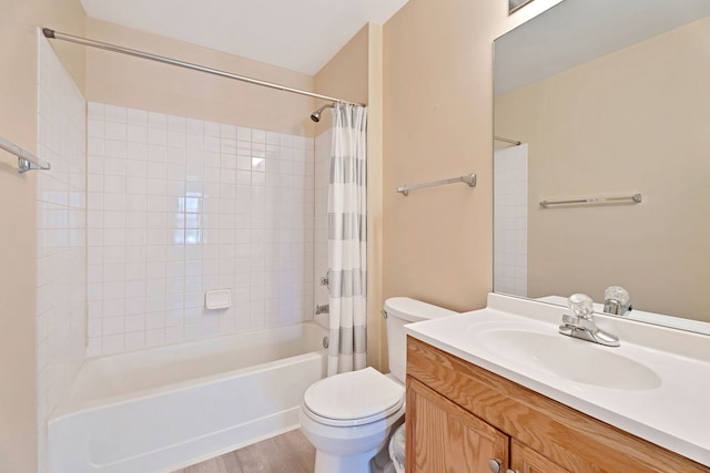 full bathroom featuring vanity, wood-type flooring, shower / bath combination with curtain, and toilet