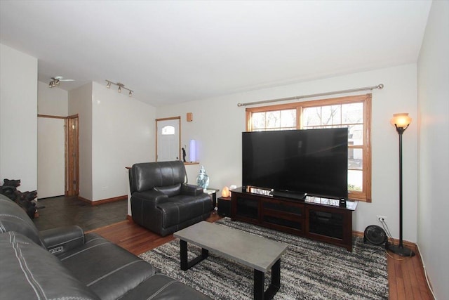 living room featuring dark hardwood / wood-style flooring