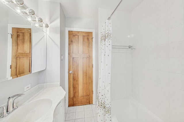 bathroom with shower / tub combo with curtain, vanity, and tile patterned floors