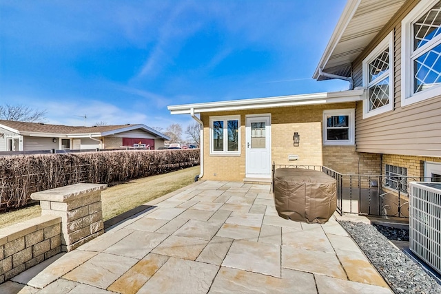 view of patio with central AC unit