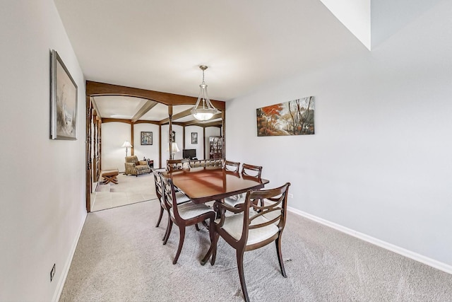 view of carpeted dining area