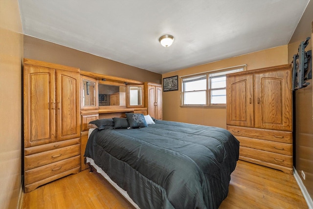 bedroom featuring light hardwood / wood-style floors