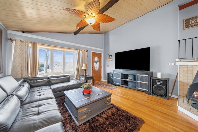 living room featuring ceiling fan, wooden ceiling, vaulted ceiling, and light wood-type flooring