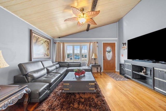 living room featuring wood ceiling, wood-type flooring, ceiling fan, and vaulted ceiling