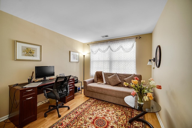 home office featuring light hardwood / wood-style flooring